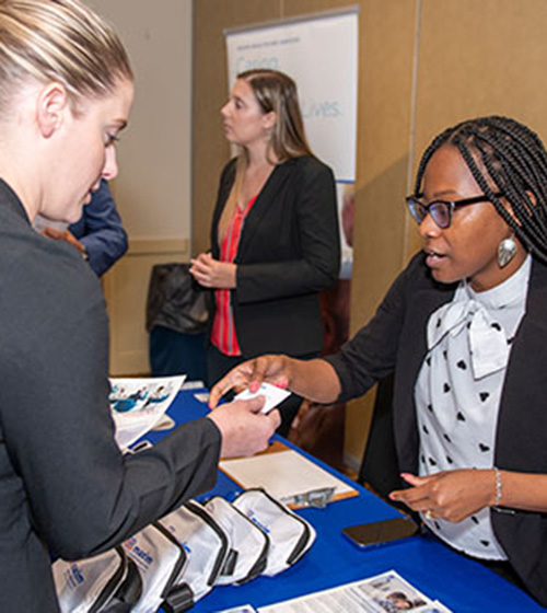 Military spouse speaks with an employer